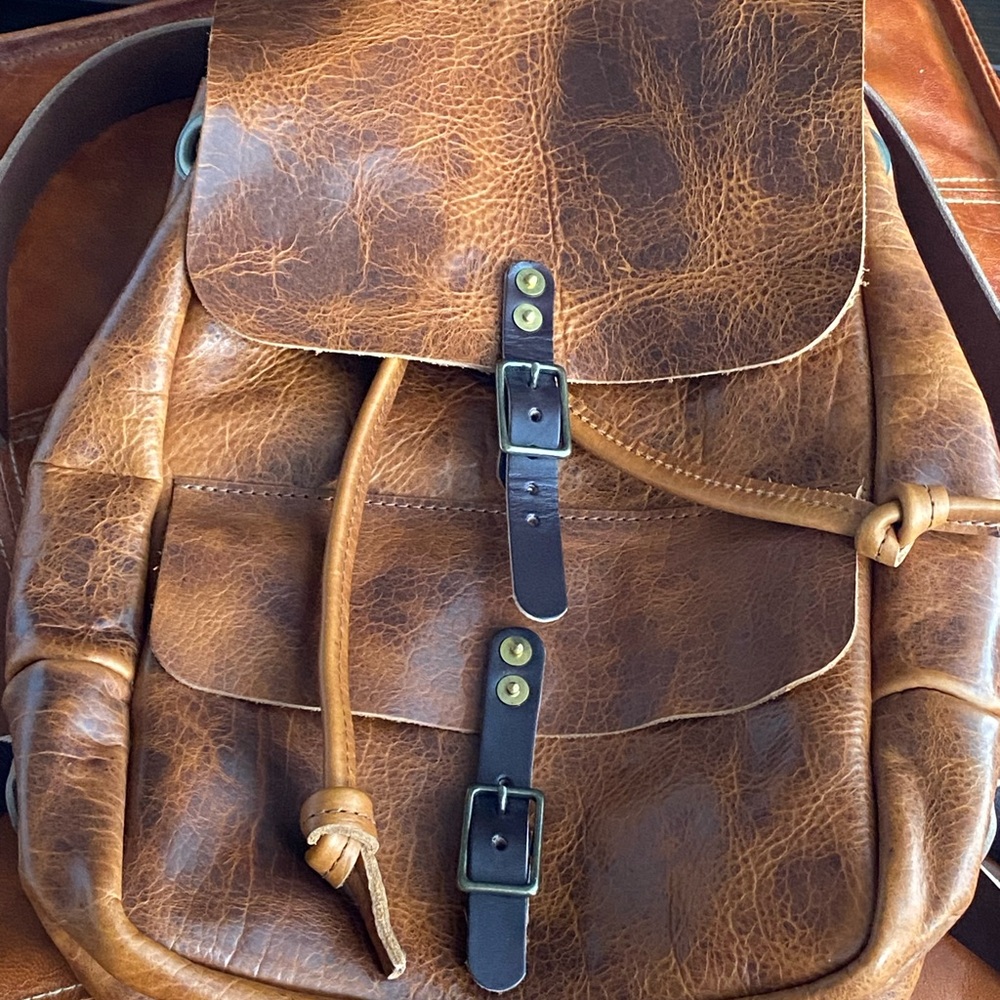 Go forth goods peanut bison Leather Backpack with Buckle Accents